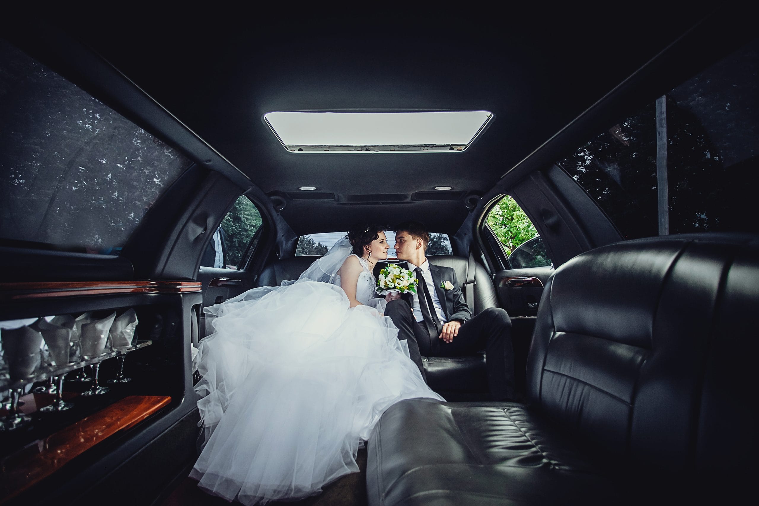 The,Couple,Sitting,In,The,Limo.,Portrait,Of,A,Beautiful